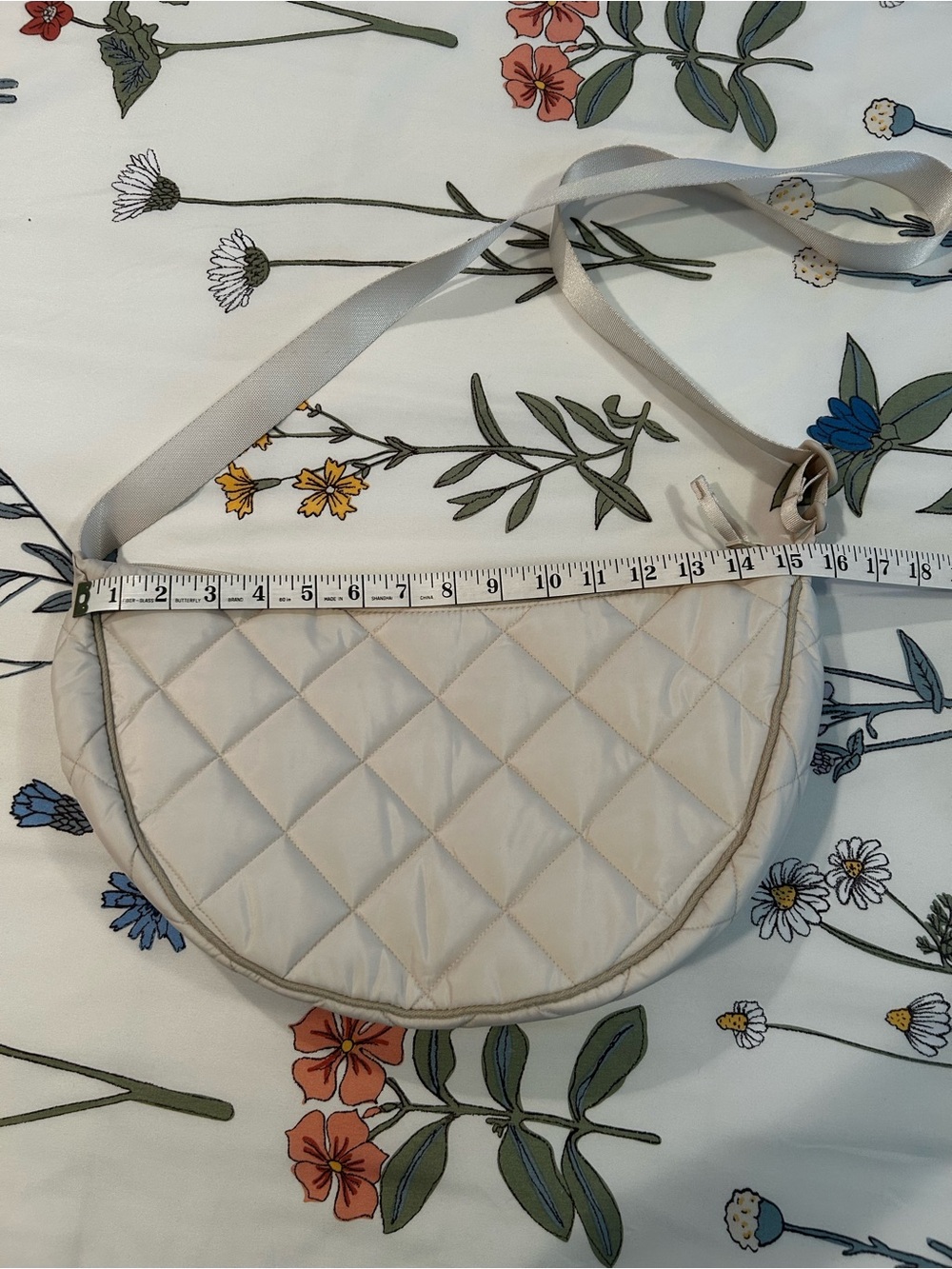 Quilted Half-Moon Crossbody Bag in Light Beige